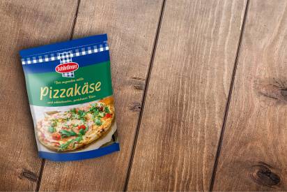 Das Bild zeigt den Schärdinger Pizzakäse gerieben
